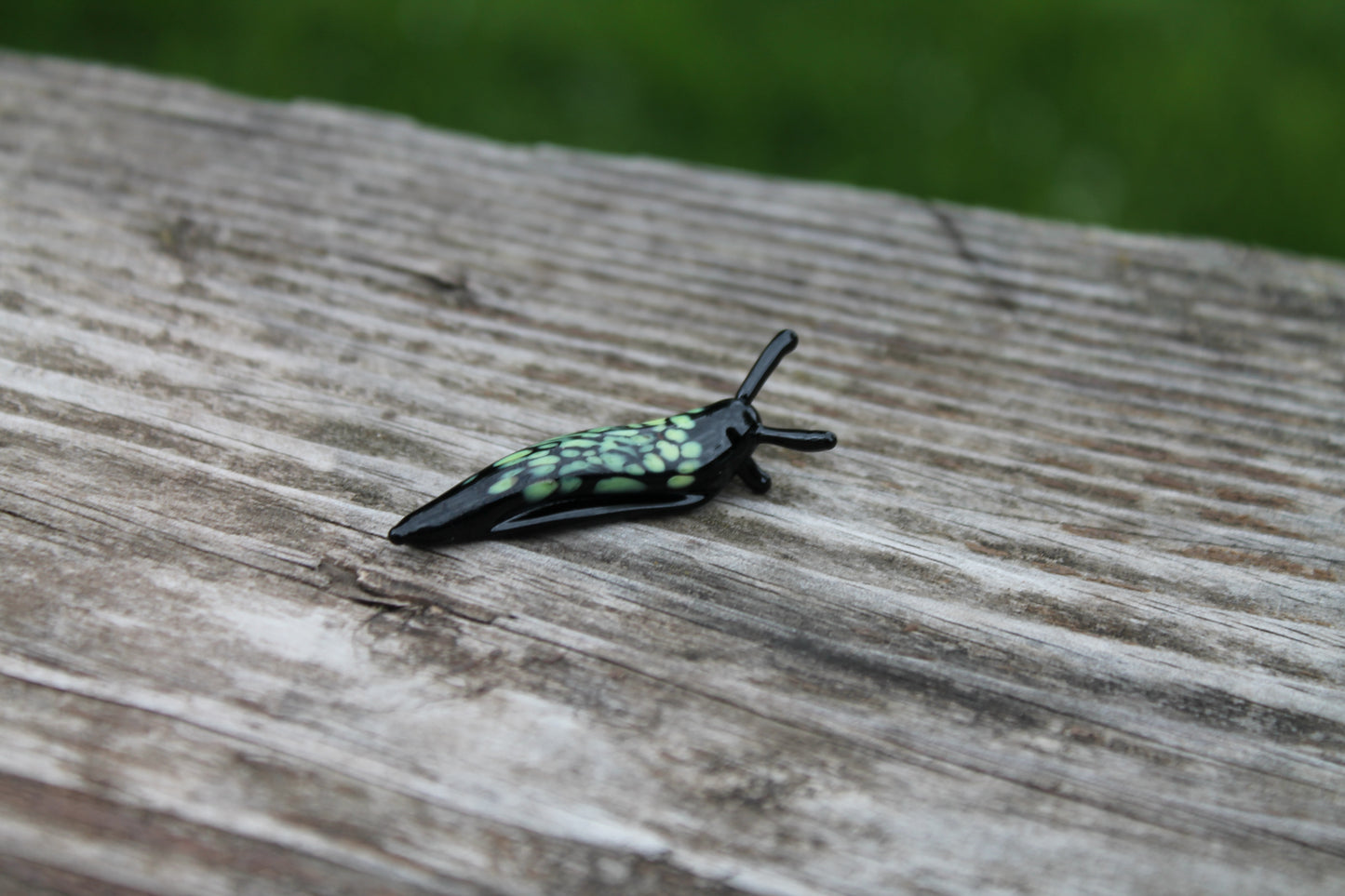 Miniature Black And Green Glass Slug Figurine For Nature Lovers