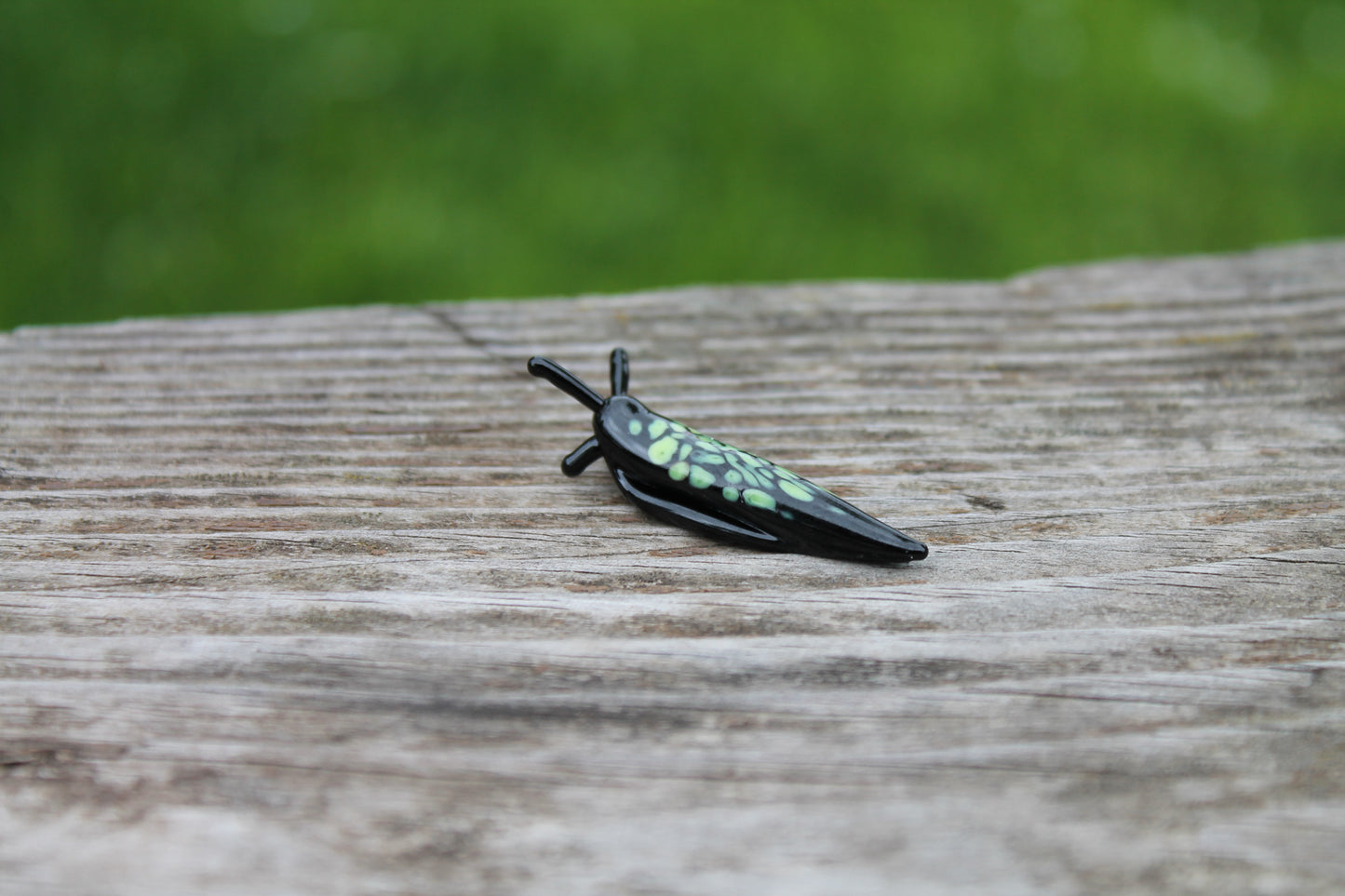 Miniature Black And Green Glass Slug Figurine For Nature Lovers