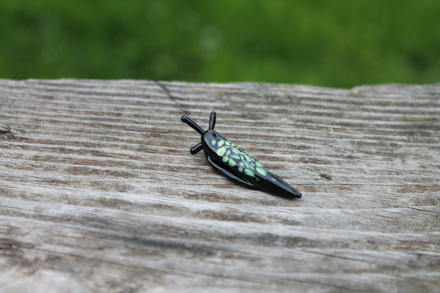 Miniature Black And Green Glass Slug Figurine For Nature Lovers