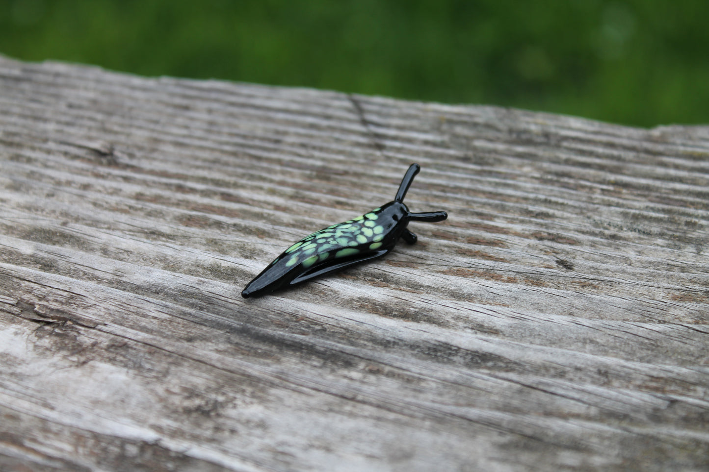 Miniature Black And Green Glass Slug Figurine For Nature Lovers