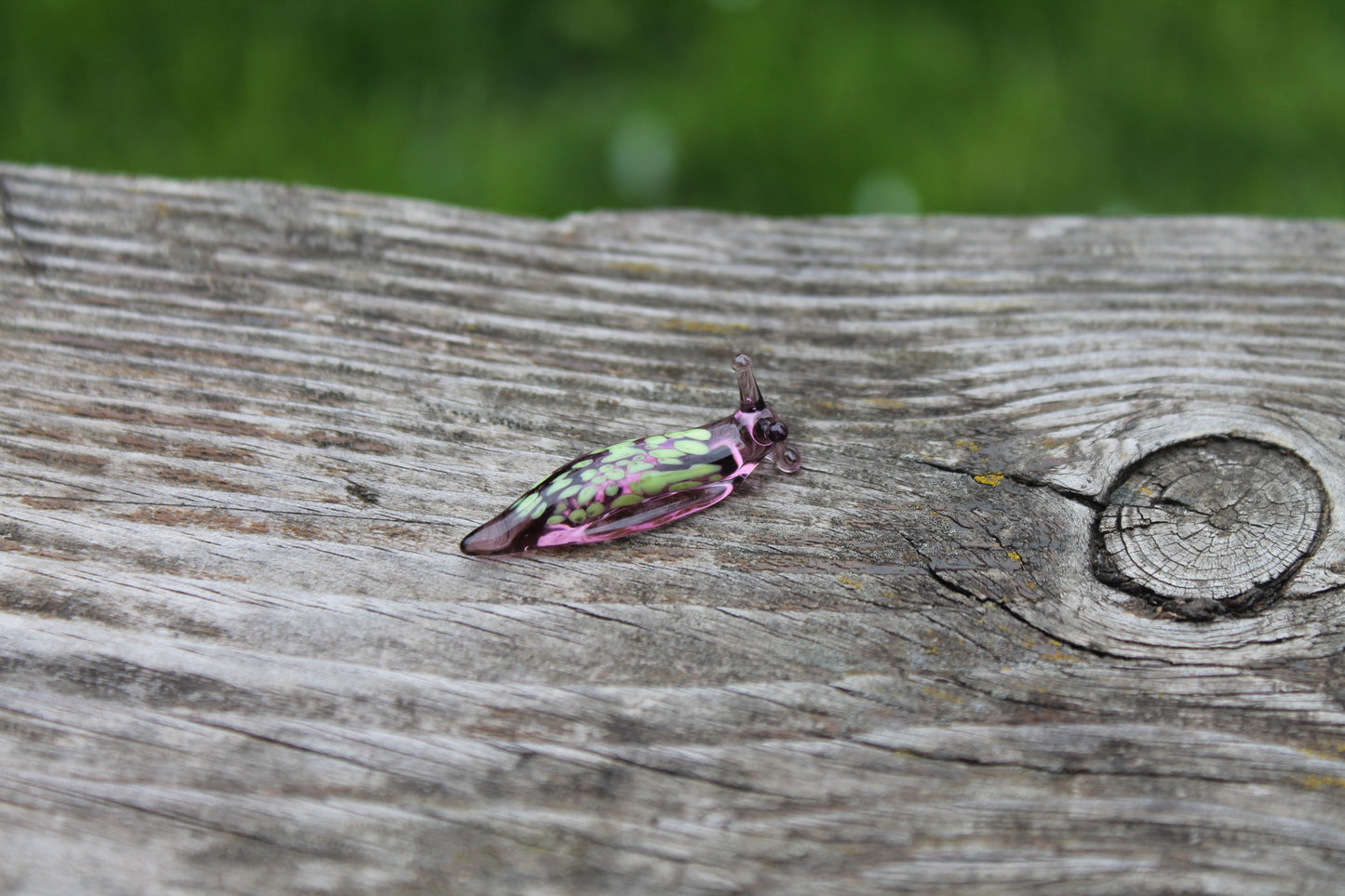 Purple Glass Slug Figurine With Green Petal Pattern, Unique Design