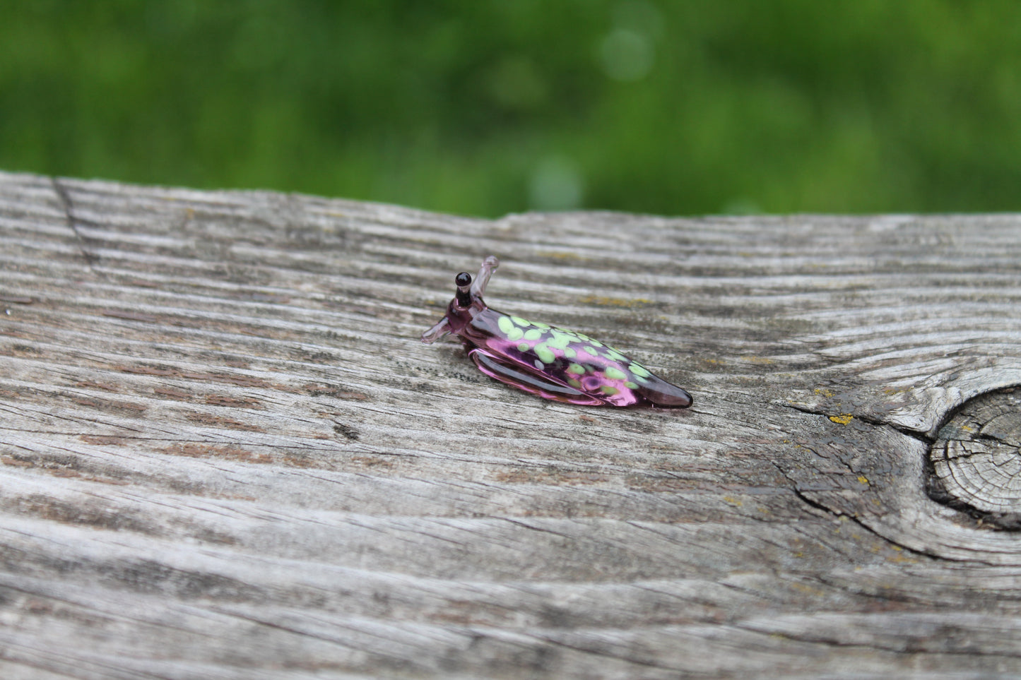 Purple Glass Slug Figurine With Green Petal Pattern, Unique Design
