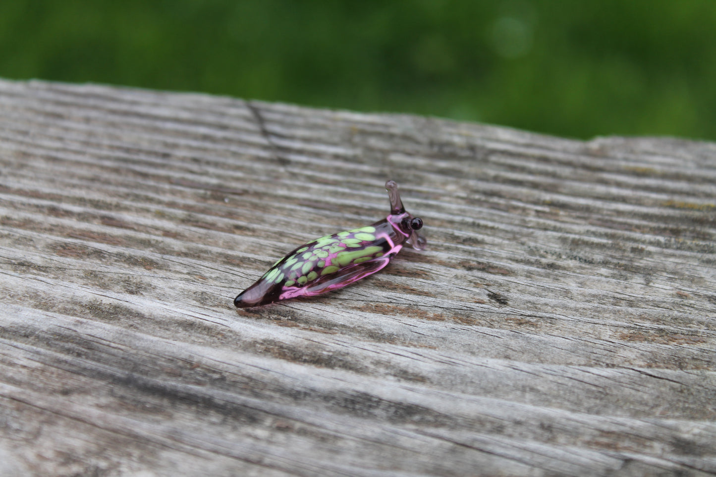 Purple Glass Slug Figurine With Green Petal Pattern, Unique Design