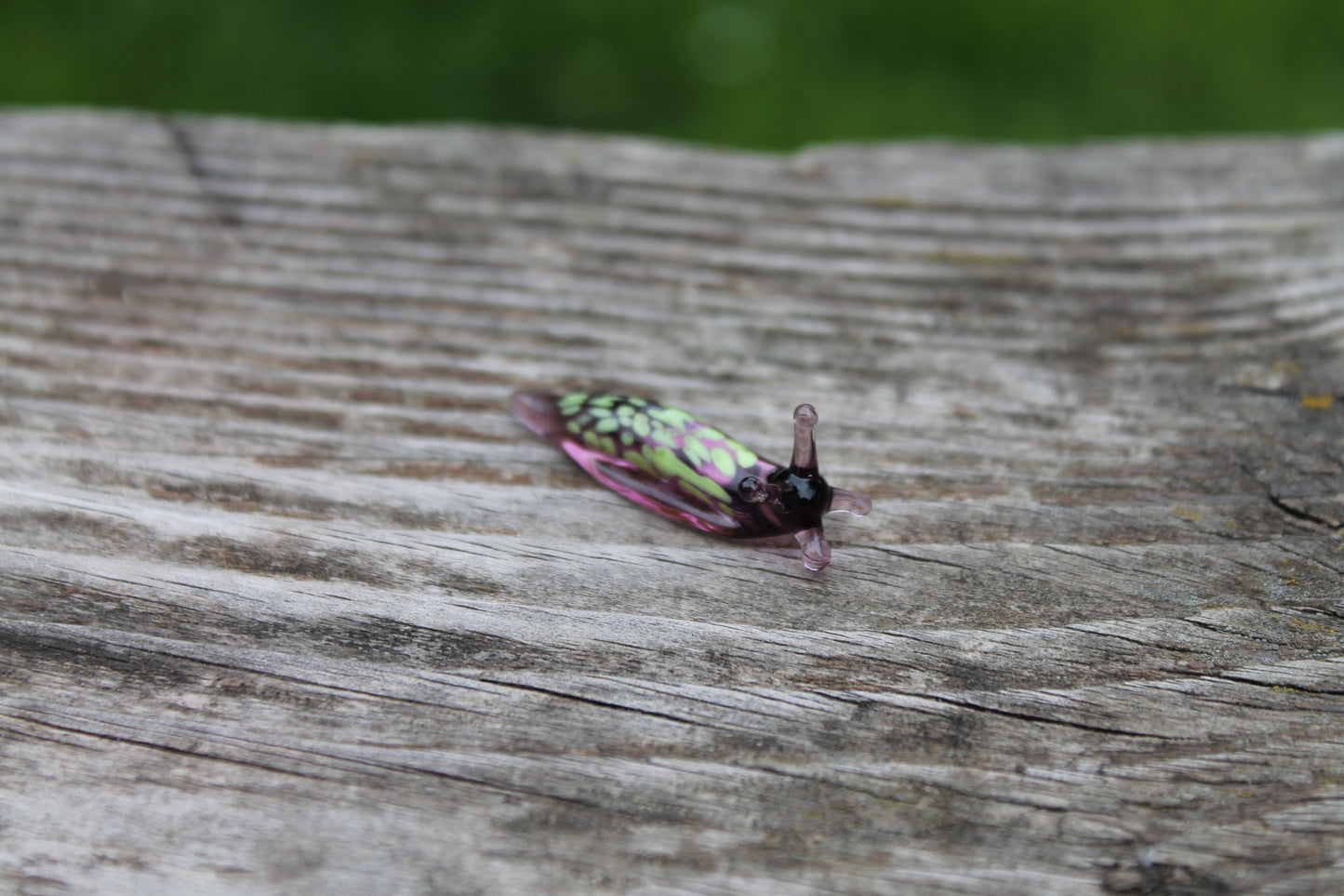 Purple Glass Slug Figurine With Green Petal Pattern, Unique Design