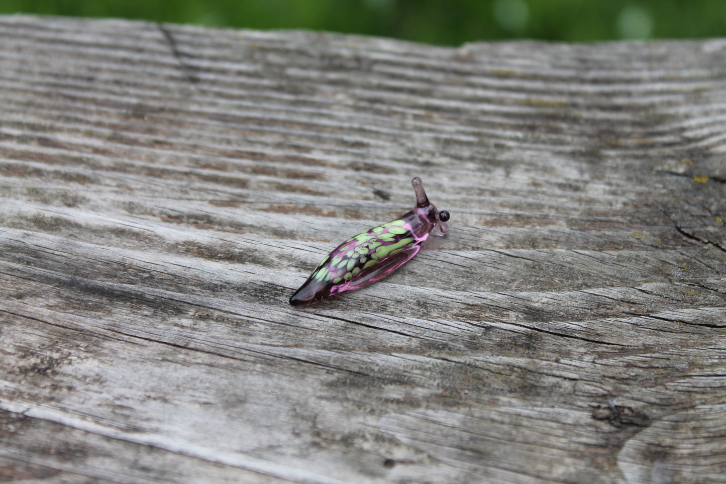 Purple Glass Slug Figurine With Green Petal Pattern, Unique Design