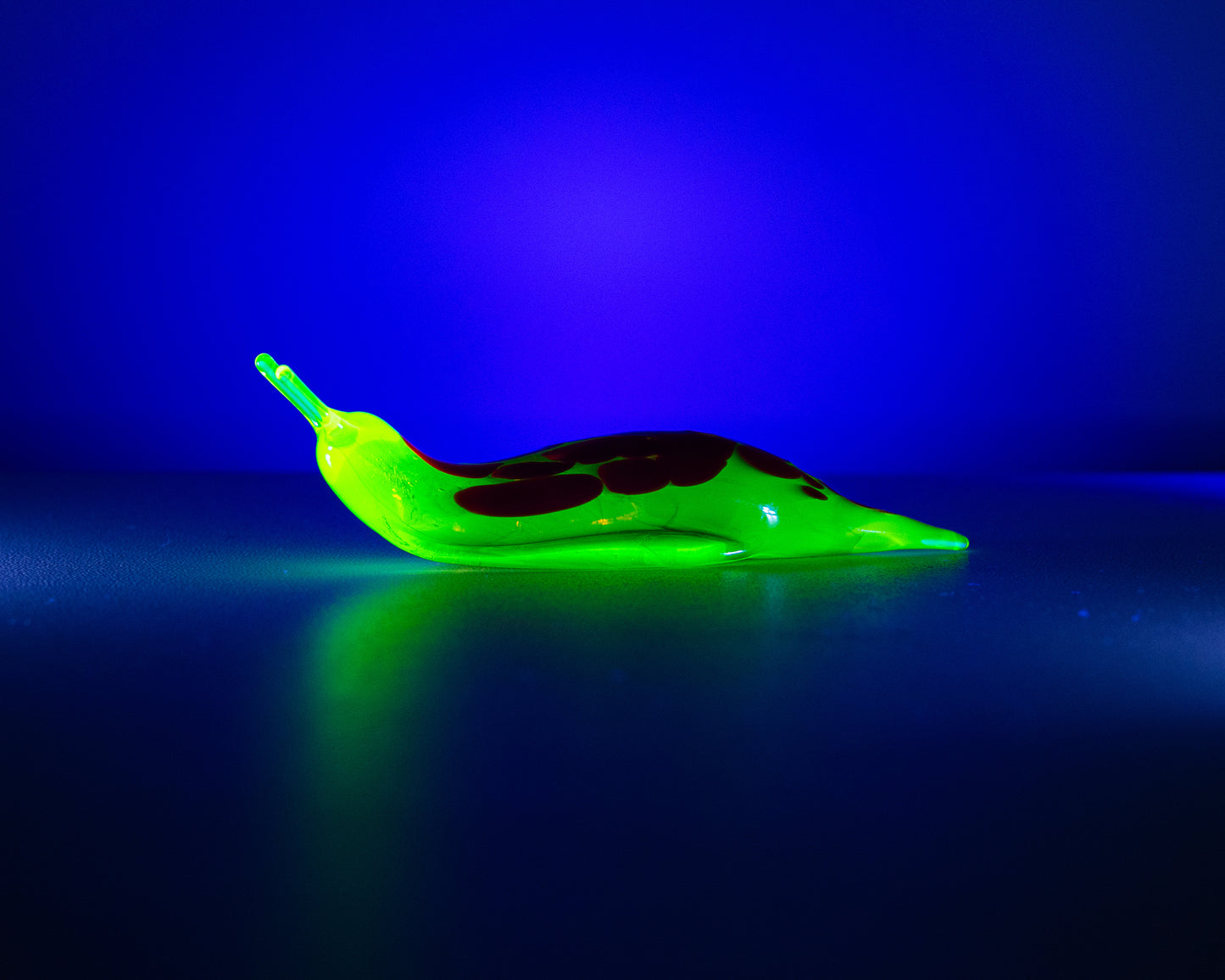 Deep Bronze Red Uranium Glass Slug Figurine UV Reactive Green Hand Blown Lampwork Animal Art Collectible Gift