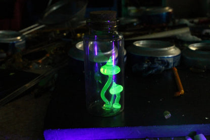 Tiny Uranium Glass Mushrooms Encased in Bottle - Collectible