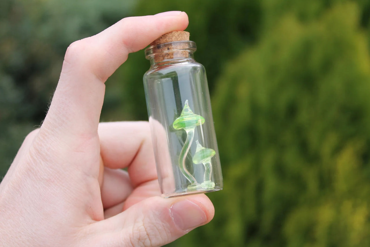 Tiny Uranium Glass Mushrooms Encased in Bottle - Collectible