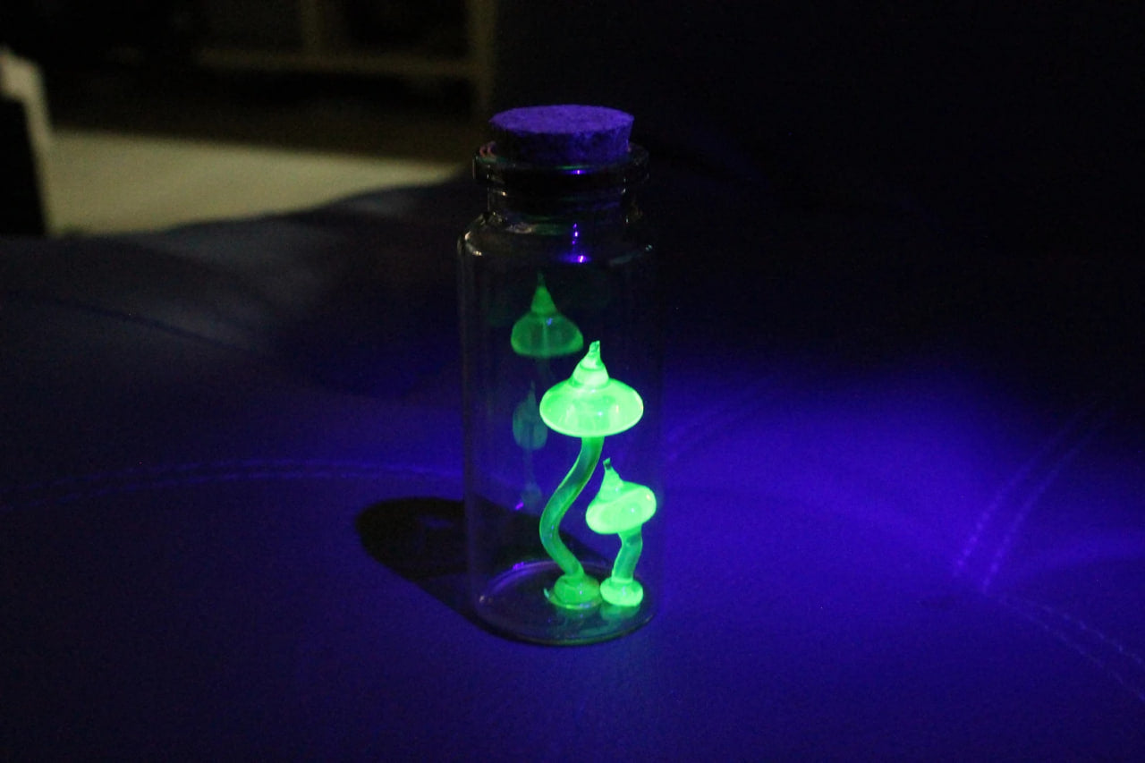 Tiny Uranium Glass Mushrooms Encased in Bottle - Collectible