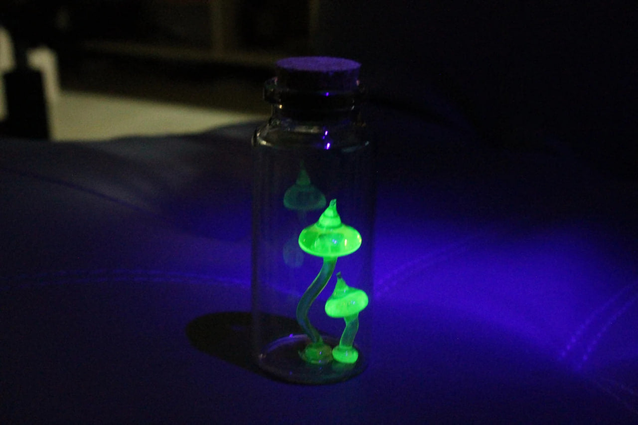 Tiny Uranium Glass Mushrooms Encased in Bottle - Collectible