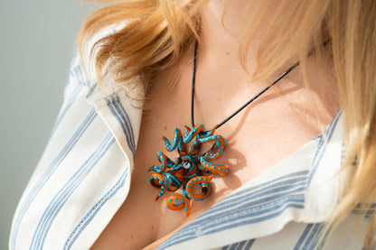 The Orange and turquoise Octopus pendant blown glass octopus necklace